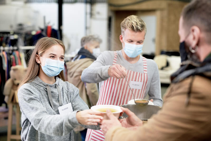 MyLink - Volunteers serving soup